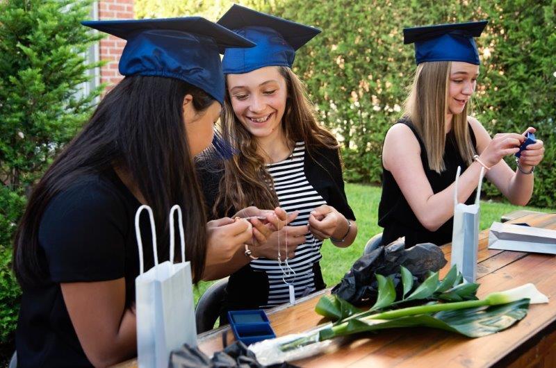 Catholic students opening graduation religious st. medal gift